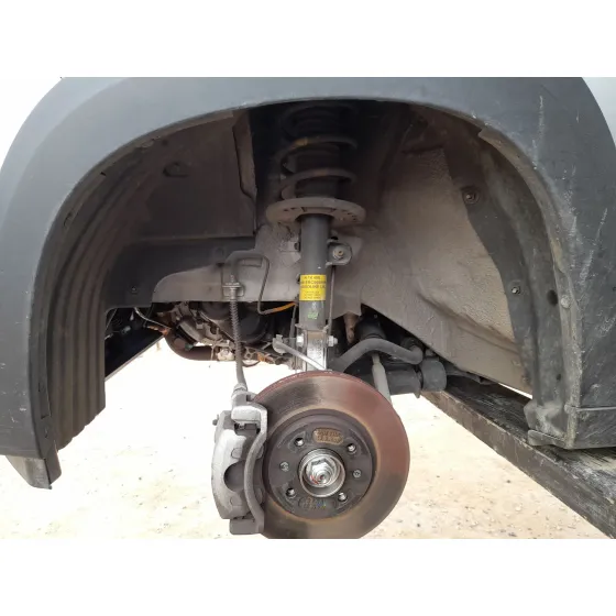 Plastico Pase Rueda Del. Izq. para Mahindra Kuv 100 Nxt