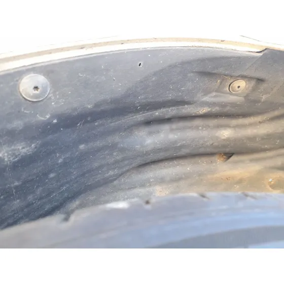 Plastico Pase Rueda Tras. Izq. para Opel Corsa F (P2Jo)