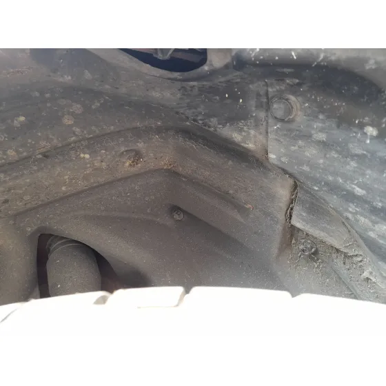 Plastico Pase Rueda Tras. Izq. para Toyota Yaris (_P21_, _Pa1_, _Ph1_)