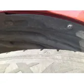 Plastico Pase Rueda Tras. Izq. para Opel Corsa F (P2Jo)