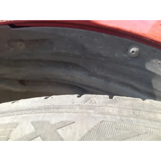 Plastico Pase Rueda Tras. Izq. para Opel Corsa F (P2Jo)
