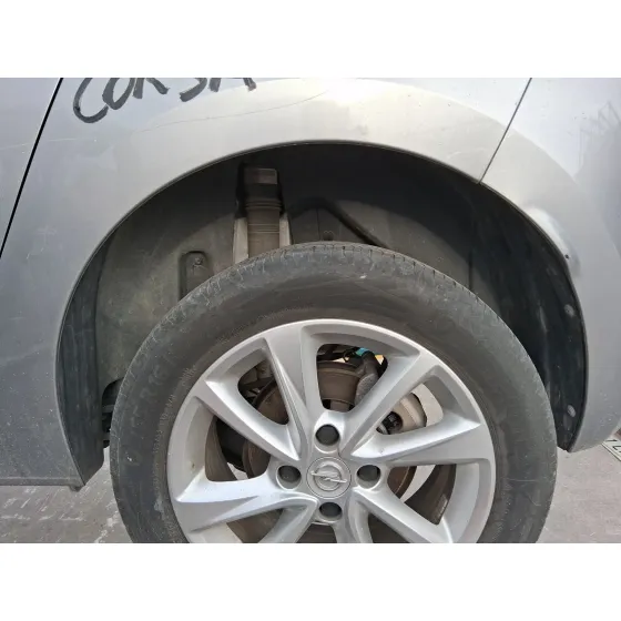 Plastico Pase Rueda Tras. Izq. para Opel Corsa F (P2Jo)