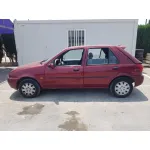 FORD FIESTA BERLINA '1998 QUARZ GRANATE