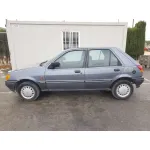 FORD FIESTA BERL./COURIER '1990 SI GIS OSCURO