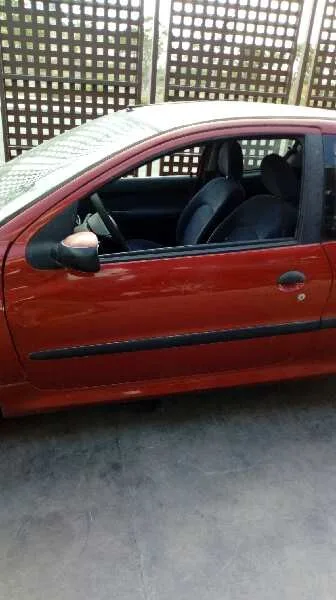 PEUGEOT 206 BERLINA '2002 XT ROJO