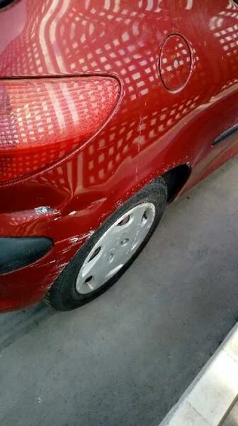 PEUGEOT 206 BERLINA '2002 XT ROJO