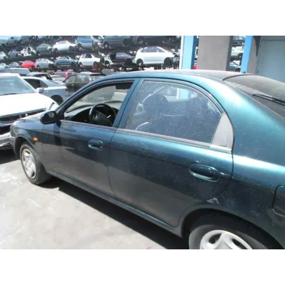 KIA SHUMA '1999 1.5 COMFORT 5 BERLINA VERDE