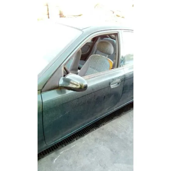 KIA SHUMA '1999 1.5 LS BERLINA PORTON VERDE OSCURO