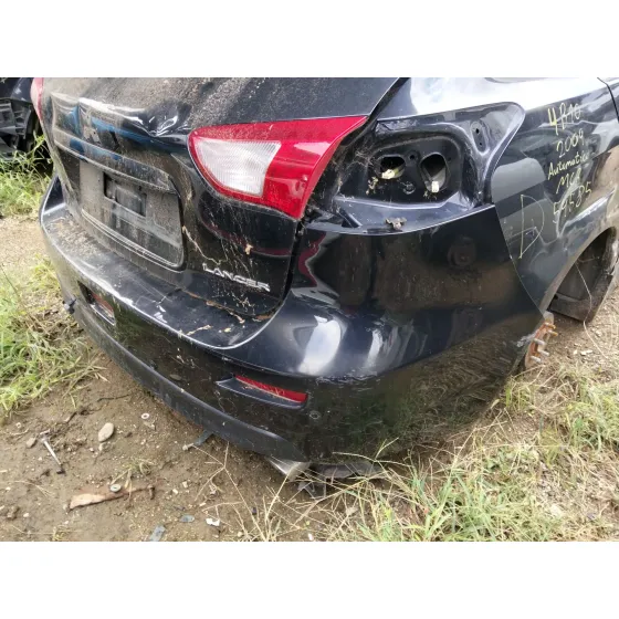 Paragolpes Trasero para Mitsubishi Lancer Viii (Cy_A, Cz_A)