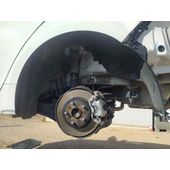 Plastico Pase Rueda Tras. Izq. para Toyota Corolla (E21)